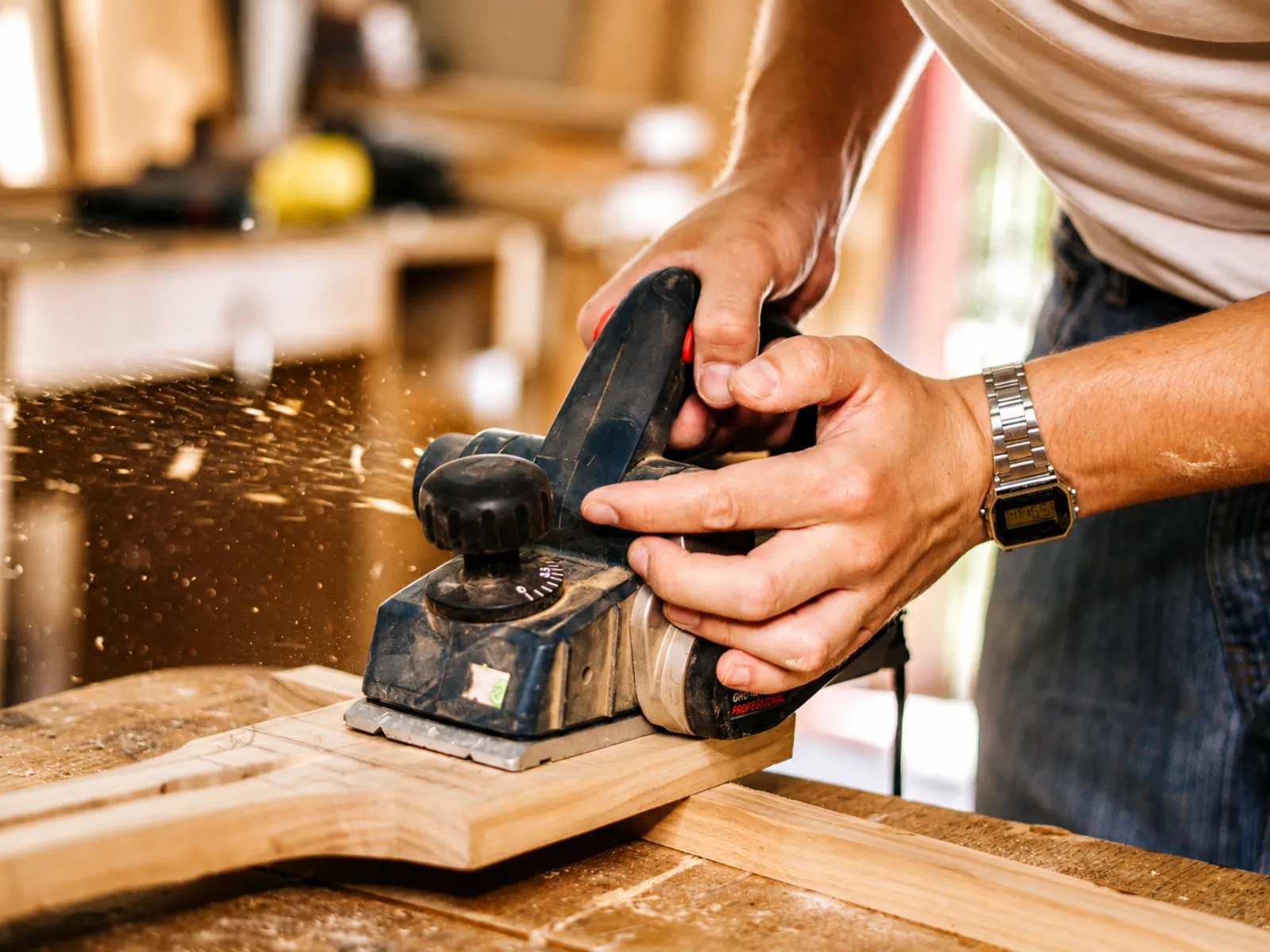 Carpenter hand-finishing wood detail
