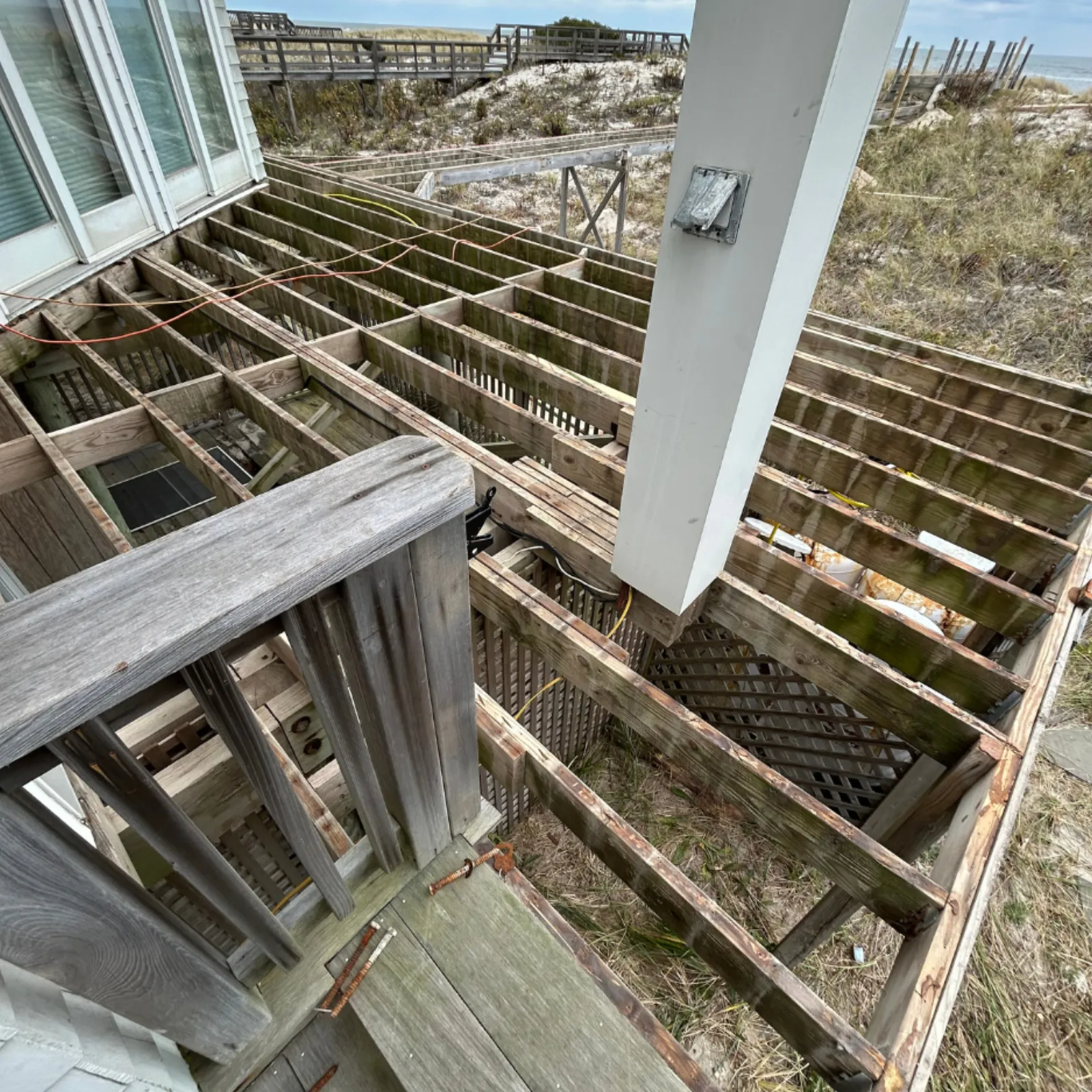 Hamptons oceanfront deck — full rebuild in mahogany — before