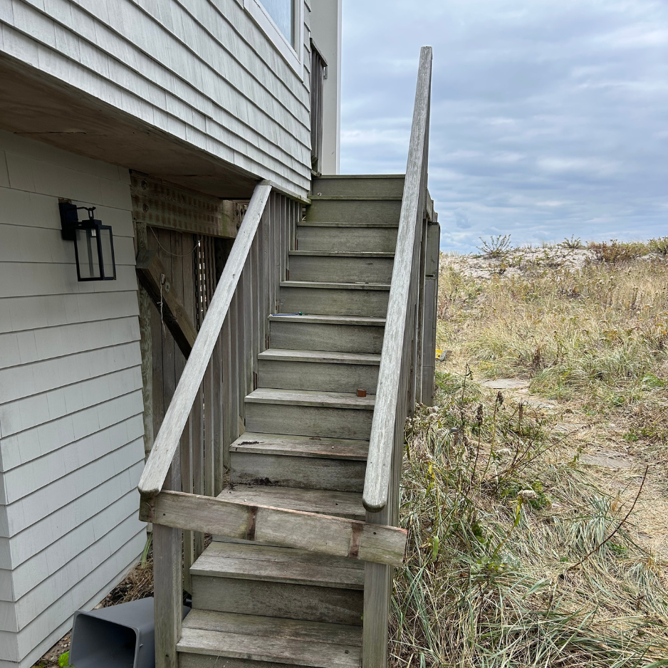 Exterior staircase — full rebuild with new mahogany treads and railings — before