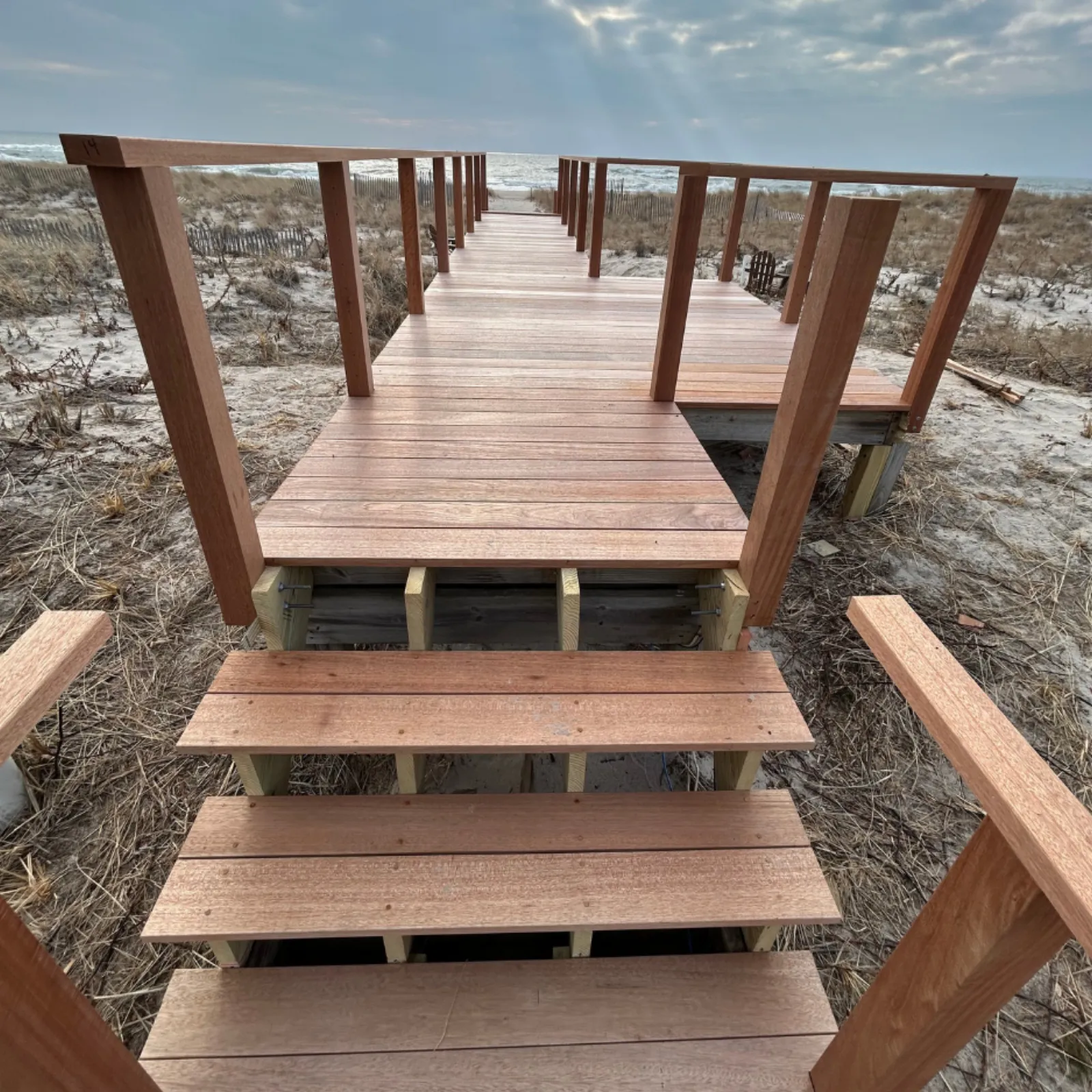 Beachfront walkway & stairs — full structural rebuild in mahogany — after