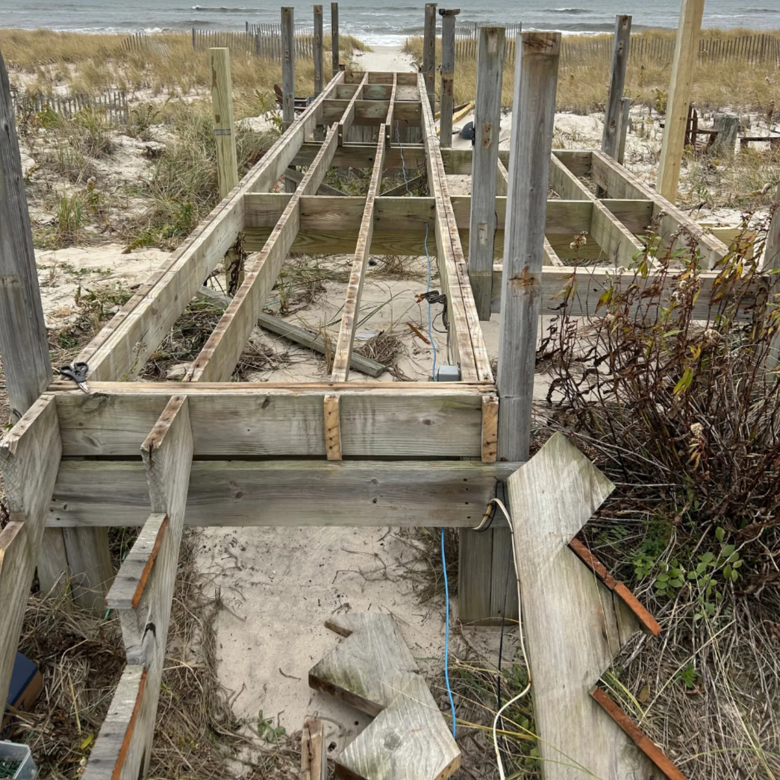 Beachfront walkway & stairs — full structural rebuild in mahogany — before